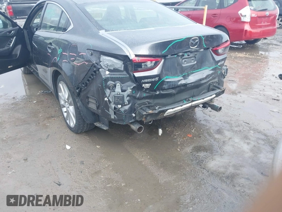 2017 Mazda Mazda6 Touring with VIN JM1GL1V5XH1135153, listed as a IAAI auction lot 41666876 with 71,674 mi miles. Bid and sale history available at carsss.com. Image 6.