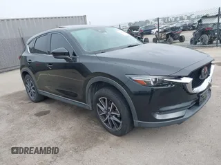 2018 Mazda CX-5 Grand Touring z VIN JM3KFADM8J1344205, wystawiony jako IAAI lot #41862265 z przebiegiem 120 710 mil mil oraz . Historia ofert i sprzedaży dostępna na DreamBid. Obrazek 1.
