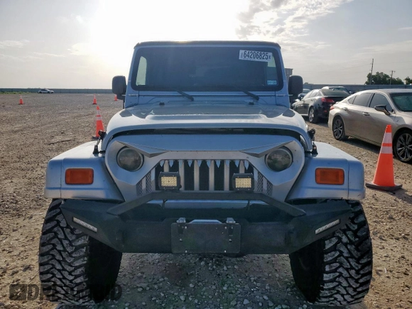 2005 Jeep Wrangler X с VIN 1J4FA39S45P353119, выставлен на аукционе Copart как лот 64206825 с пробегом 134 298 миль миль и Списание • Salvage title. История ставок и продаж доступна на DreamBid. Изображение 5.