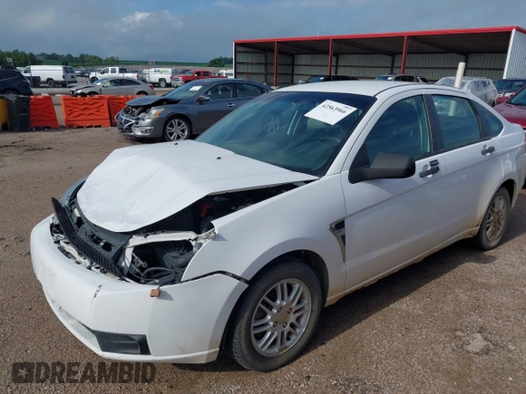 2008 Ford Focus SE with VIN 1FAHP35N18W265206, listed as a IAAI auction lot 42563966 with 122,103 mi miles and . Bid and sale history available at DreamBid. Image 2.