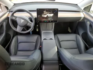 2023 Tesla Model Y Long Range with VIN 7SAYGDEEXPF844622, listed as a Copart auction lot 49094465 with 35,191 mi miles and Salvage Title. Bid and sale history available at DreamBid. Image 8.