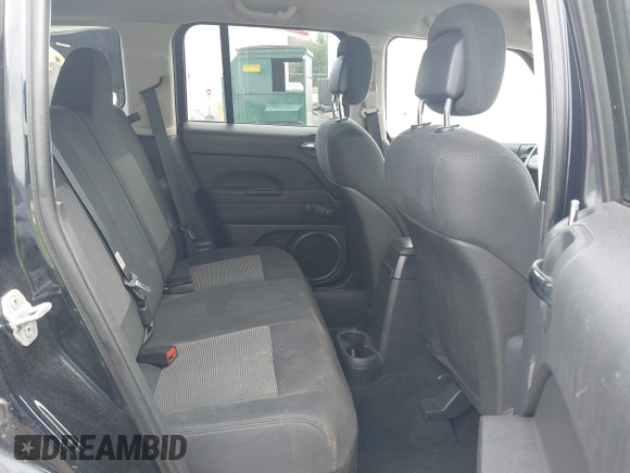 2011 Jeep Patriot Sport with VIN 1J4NT1GAXBD180787, listed as a IAAI auction lot 42102556 with 95,426 mi miles and . Bid and sale history available at DreamBid. Image 8.