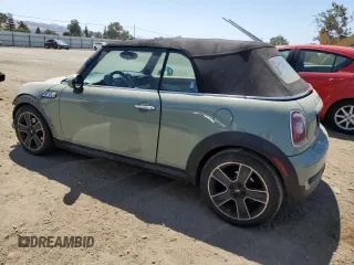 2010 MINI Convertible S z VIN WMWMS3C52ATZ84995, wystawiony jako Copart lot #63445985 z przebiegiem 51 266 mil mil oraz Szkoda całkowita • Salvage title. Historia ofert i sprzedaży dostępna na DreamBid. Obrazek 2.