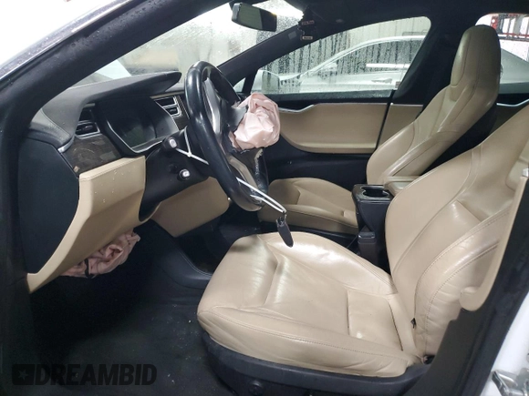 2015 Tesla Model S 85D with VIN 5YJSA1H24FF092628, listed as a Copart auction lot 51959035 with 128,744 mi miles and Salvage Title. Bid and sale history available at carsss.com. Image 7.