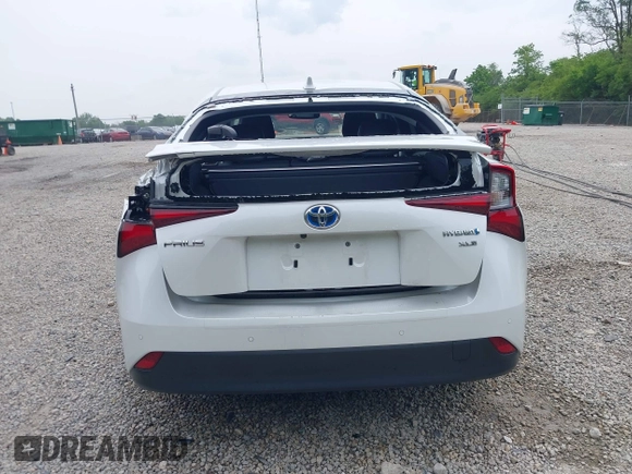 2021 Toyota Prius L Eco with VIN JTDKAMFU6M3137679, listed as a IAAI auction lot 42488129 with 52,414 mi miles and . Bid and sale history available at DreamBid. Image 17.