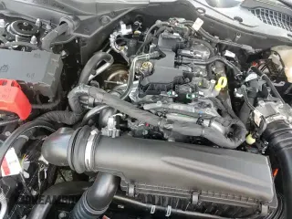 2025 Ford Mustang EcoBoost z VIN 1FA6P8TH0S5124853, wystawiony jako Copart lot #69196785 z przebiegiem 1 807 mil mil oraz Szkoda całkowita • Salvage title. Historia ofert i sprzedaży dostępna na DreamBid. Obrazek 15.