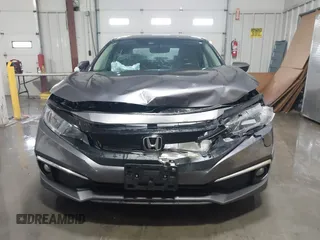 2020 Honda Civic EX-L with VIN 19XFC1F70LE010163, listed as a IAAI auction lot 41306532 with 88,767 mi miles and . Bid and sale history available at DreamBid. Image 12.