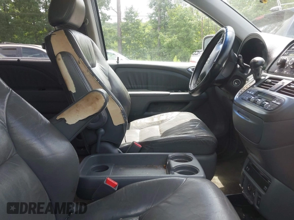 2005 Honda Odyssey EX-L with VIN 5FNRL38745B083510, listed as a IAAI auction lot 42534287 with 304,298 mi miles and . Bid and sale history available at DreamBid. Image 5.