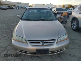 2001 Honda Accord LX z VIN 1HGCG16461A067174, wystawiony jako Copart lot #87543245 z przebiegiem 148 410 mil mil oraz Czysty tytuł • Clean title. Historia ofert i sprzedaży dostępna na DreamBid. Obrazek 5.