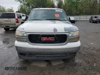 2005 GMC Yukon XL SLE z VIN 1GKEC16Z25J175610, wystawiony jako Copart lot #51051785 z przebiegiem 271 619 mil mil oraz Szkoda całkowita • Salvage title. Historia ofert i sprzedaży dostępna na DreamBid. Obrazek 5.