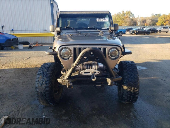 2004 Jeep Wrangler Rubicon with VIN 1J4FA69S74P787812, listed as a Copart auction lot 84715464 with 150,320 mi miles and Salvage Title. Bid and sale history available at carsss.com. Image 5.