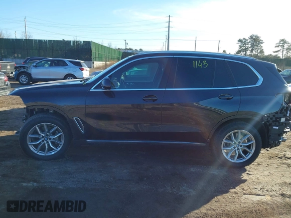 2023 BMW X5 xDrive40i with VIN 5UXCR6C01P9P96005, listed as a IAAI auction lot 41415624 with 15,879 mi miles and . Bid and sale history available at DreamBid. Image 14.