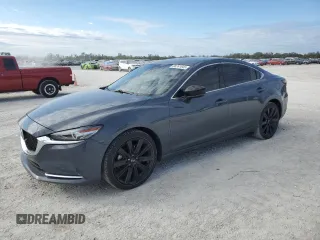 2021 Mazda 6 Carbon Edition with VIN JM1GL1WY6M1618139, listed as a Copart auction lot 88761045 with 82,377 mi miles and Non Repairable. Bid and sale history available at DreamBid. Image 1.