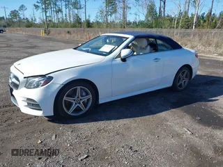 2018 Mercedes-Benz E 400 with VIN WDD1K6GBXJF031138, listed as a IAAI auction lot 41704112 with 51,133 mi miles and . Bid and sale history available at DreamBid. Image 2.