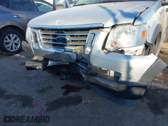 2010 Ford Explorer Sport Trac XLT z VIN 1FMEU3BE6AUF01646, wystawiony jako IAAI lot #41646440 z przebiegiem 58 473 mil mil oraz . Historia ofert i sprzedaży dostępna na DreamBid. Obrazek 6.