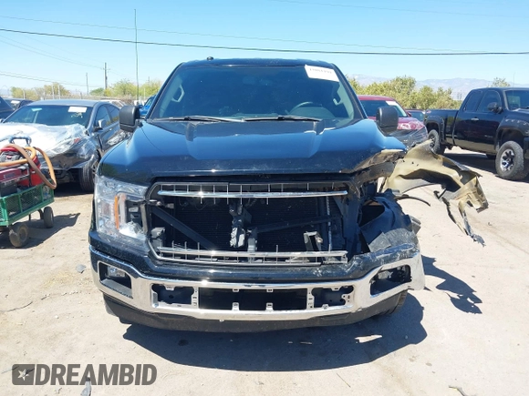 2018 Ford F-150 XL with VIN 1FTEW1C50JKF28600, listed as a IAAI auction lot 42081191 with 105,636 mi miles and . Bid and sale history available at DreamBid. Image 13.