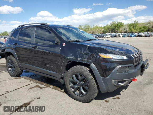 2014 Jeep Cherokee Trailhawk z VIN 1C4PJMBS1EW239692, wystawiony jako Copart lot #57153065 z przebiegiem 111 899 mil mil oraz Szkoda całkowita • Salvage title. Historia ofert i sprzedaży dostępna na DreamBid. Obrazek 4.