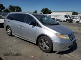 2011 Honda Odyssey Touring с VIN 5FNRL5H92BB063040, выставлен на аукционе Copart как лот 58551765 с пробегом 236 526 миль миль и Списание • Salvage title. История ставок и продаж доступна на DreamBid. Изображение 4.