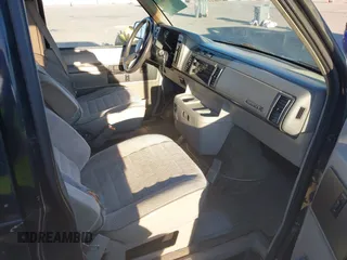 1991 Chevrolet Astro with VIN 1GNDM19Z2MB123653, listed as a IAAI auction lot 41388286 with 175,009 mi miles. Bid and sale history available at carsss.com. Image 5.