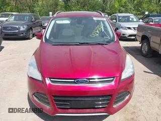 2014 Ford Escape Titanium with VIN 1FMCU0JX8EUC19300, listed as a IAAI auction lot 42138925 with 111,709 mi miles. Bid and sale history available at carsss.com. Image 6.