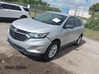 2018 Chevrolet Equinox LS with VIN 2GNAXHEV1J6110087, listed as a IAAI auction lot 42175959 with 124,611 mi miles and . Bid and sale history available at DreamBid. Image 17.