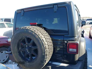 2018 Jeep Wrangler Unlimited Sport z VIN 1C4HJXDN9JW231587, wystawiony jako IAAI lot #41564880 z przebiegiem 129 003 mil mil oraz . Historia ofert i sprzedaży dostępna na DreamBid. Obrazek 16.
