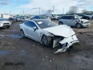 2021 Tesla Model S Long Range Plus with VIN 5YJSA1E20MF426400, listed as a IAAI auction lot 41453704 with Not provided miles and . Bid and sale history available at DreamBid. Image 1.
