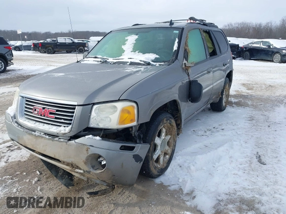 2007 GMC Envoy SLE with VIN 1GKDT13S072246688, listed as a IAAI auction lot 41258265 with 218,001 mi miles. Bid and sale history available at carsss.com. Image 6.