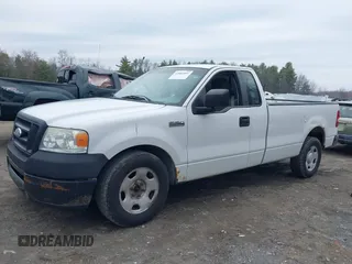 2007 Ford F-150 XL with VIN 1FTRF12257NA47662, listed as a IAAI auction lot 42003991 with 154,502 mi miles. Bid and sale history available at carsss.com. Image 6.