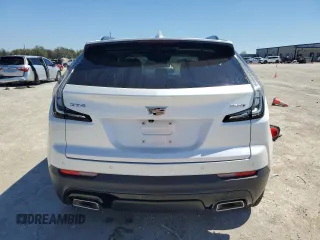 2021 Cadillac XT4 FWD Sport with VIN 1GYFZER42MF076951, listed as a Copart auction lot 46797935 with 35,886 mi miles and Salvage Title. Bid and sale history available at DreamBid. Image 6.