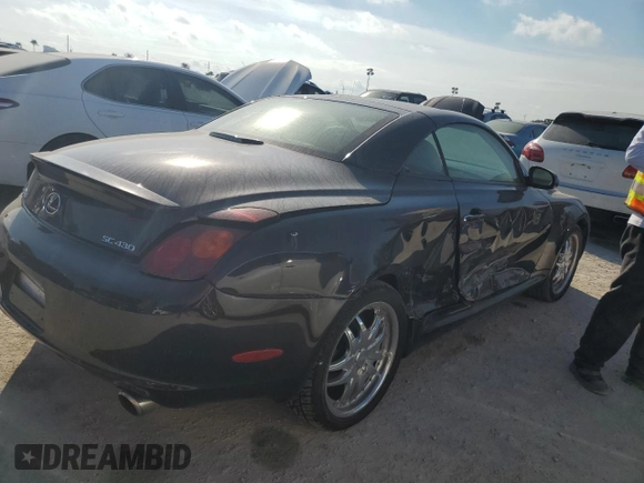 2002 Lexus SC 430 with VIN JTHFN48Y520034983, listed as a Copart auction lot 74084354 with 88,979 mi miles and Salvage Title. Bid and sale history available at DreamBid. Image 3.