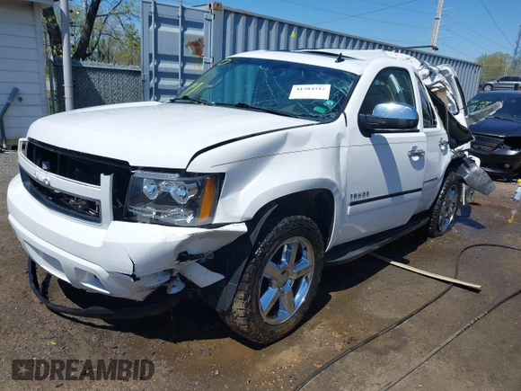 2013 Chevrolet Tahoe LTZ with VIN 1GNSKCE08DR161606, listed as a IAAI auction lot 41984912 with 189,181 mi miles and . Bid and sale history available at DreamBid. Image 2.