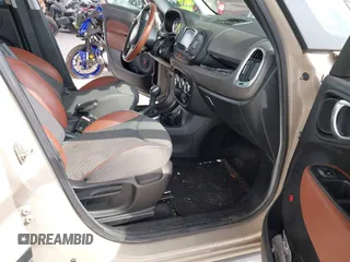 2014 FIAT 500L Trekking with VIN ZFBCFADH2EZ018037, listed as a IAAI auction lot 42196695 with 88,743 mi miles and . Bid and sale history available at DreamBid. Image 5.