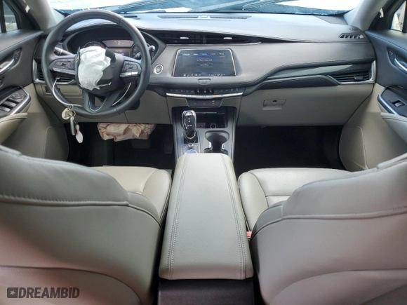 2023 Cadillac XT4 FWD Premium Luxury with VIN 1GYFZCR47PF105143, listed as a Copart auction lot 52397695 with 42,740 mi miles and Non Repairable. Bid and sale history available at carsss.com. Image 8.
