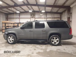 2011 Chevrolet Suburban LT with VIN 1GNSCJE0XBR180270, listed as a IAAI auction lot 41531193 with 202,493 mi miles. Bid and sale history available at carsss.com. Image 14.