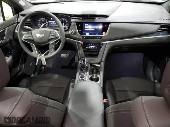 2025 Cadillac XT5 FWD Premium Luxury with VIN 1GYKNCRS9SZ120579, listed as a Copart auction lot 47656605 with 6,136 mi miles and Clean Title. Bid and sale history available at DreamBid. Image 8.
