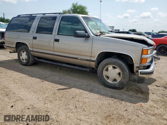 1999 Chevrolet Suburban z VIN 3GNFK16R2XG191868, wystawiony jako Copart lot #57620165 z przebiegiem 128 526 mil mil oraz Szkoda całkowita • Salvage title. Historia ofert i sprzedaży dostępna na DreamBid. Obrazek 4.