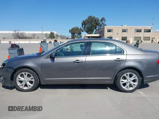 2012 Ford Fusion SE z VIN 3FAHP0HA8CR401382, wystawiony jako IAAI lot #41739680 z przebiegiem 73 404 mil mil oraz . Historia ofert i sprzedaży dostępna na DreamBid. Obrazek 14.