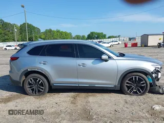 2016 Mazda CX-9 Signature with VIN JM3TCBEY7G0120023, listed as a IAAI auction lot 42431039 with 160,276 mi miles and . Bid and sale history available at DreamBid. Image 13.