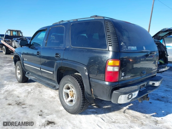 2001 Chevrolet Tahoe LS with VIN 1GNEK13T01J116989, listed as a IAAI auction lot 41871390 with 265,541 mi miles. Bid and sale history available at carsss.com. Image 3.