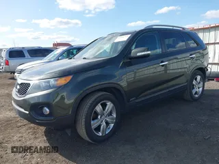 2013 Kia Sorento EX with VIN 5XYKUDA24DG331006, listed as a IAAI auction lot 41998319 with 143,141 mi miles. Bid and sale history available at carsss.com. Image 2.