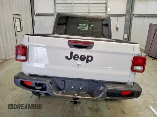 2023 Jeep Gladiator Sport S with VIN 1C6HJTAG1PL542530, listed as a Copart auction lot 60669075 with 44,323 mi miles and Salvage title. Bid and sale history available at DreamBid. Image 6.