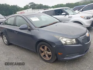 2014 Chevrolet Cruze 1LT with VIN 1G1PC5SB4E7103544, listed as a IAAI auction lot 42632096 with 119,175 mi miles and . Bid and sale history available at DreamBid. Image 1.