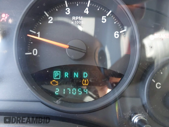 2010 Jeep Patriot Sport with VIN 1J4NT2GBXAD660180, listed as a IAAI auction lot 42146950 with 217,054 mi miles. Bid and sale history available at carsss.com. Image 7.