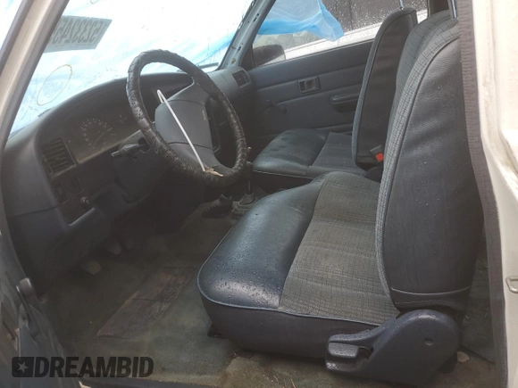 1991 Toyota Pickup с VIN JT4RN13P5M6028497, выставлен на аукционе Copart как лот 52332455 с пробегом 151 274 миль миль и Списание • Salvage title. История ставок и продаж доступна на DreamBid. Изображение 7.