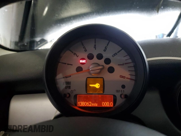 2012 MINI Hardtop with VIN WMWSU3C58CT369968, listed as a Copart auction lot 60102135 with 138,062 mi miles and Salvage title. Bid and sale history available at DreamBid. Image 9.