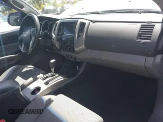 2014 Toyota Tacoma with VIN 3TMLU4EN3EM159080, listed as a IAAI auction lot 41809259 with 113,950 mi miles and . Bid and sale history available at DreamBid. Image 5.