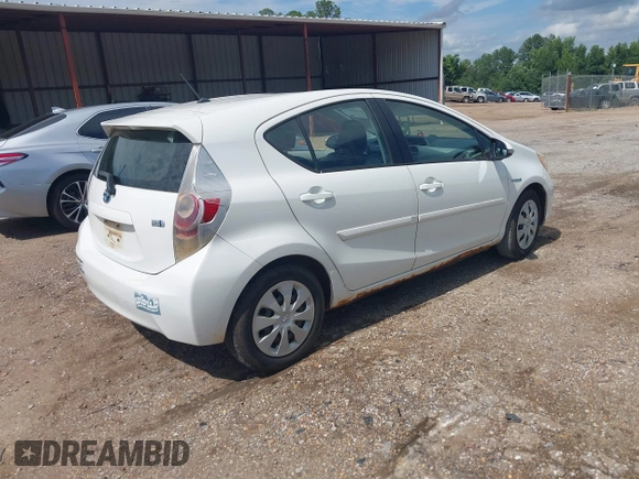 2012 Toyota Prius One z VIN JTDKDTB36C1009273, wystawiony jako IAAI lot #42454213 z przebiegiem 227 913 mil mil oraz . Historia ofert i sprzedaży dostępna na DreamBid. Obrazek 4.