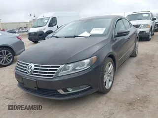 2013 Volkswagen CC R-Line z VIN WVWBN7AN5DE514951, wystawiony jako IAAI lot #42056158 z przebiegiem 108 119 mil mil oraz . Historia ofert i sprzedaży dostępna na DreamBid. Obrazek 6.