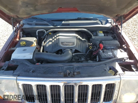 2007 Jeep Commander Limited z VIN 1J8HG58257C610852, wystawiony jako Copart lot #49461225 z przebiegiem 91 125 mil mil oraz Szkoda całkowita • Salvage title. Historia ofert i sprzedaży dostępna na DreamBid. Obrazek 13.